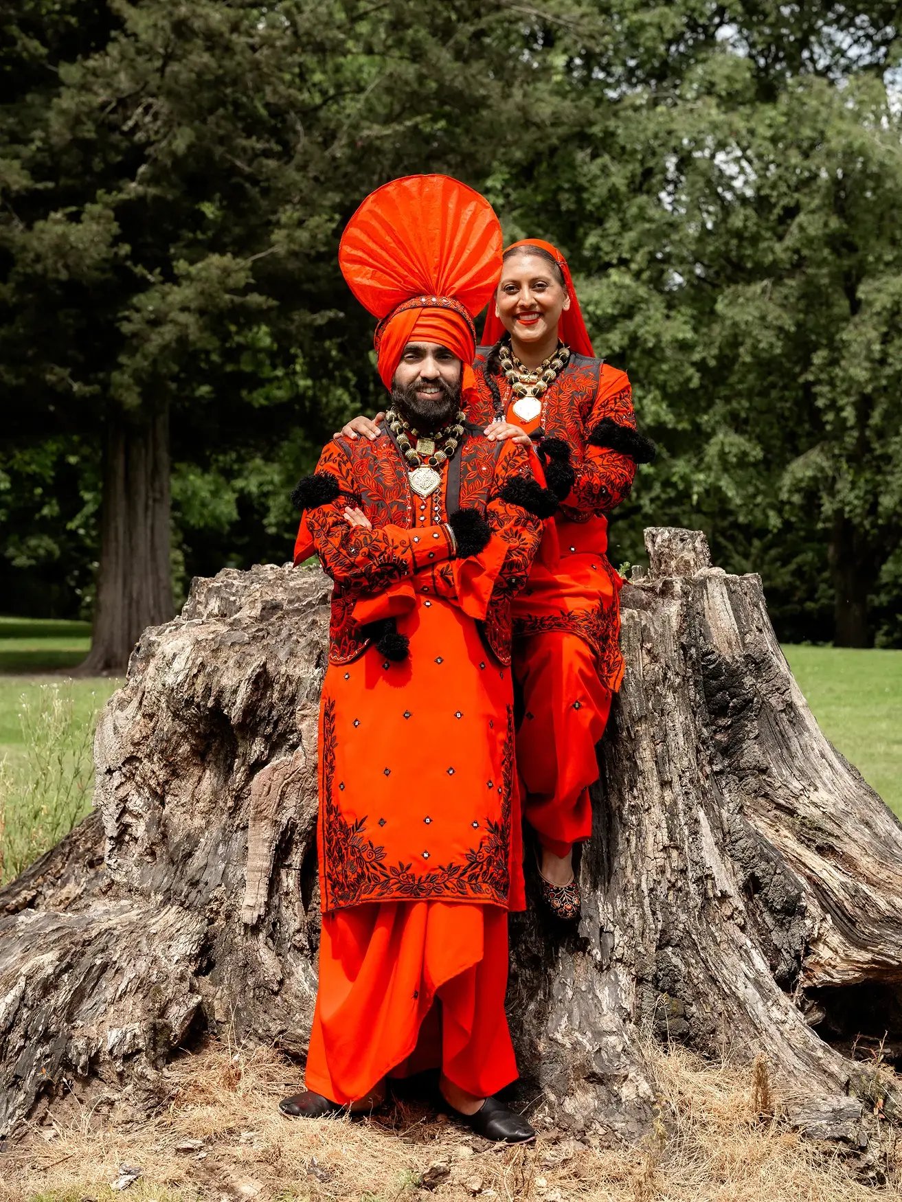 bhangra-dancers-posing-in-red-traditional-punjabi-costumes