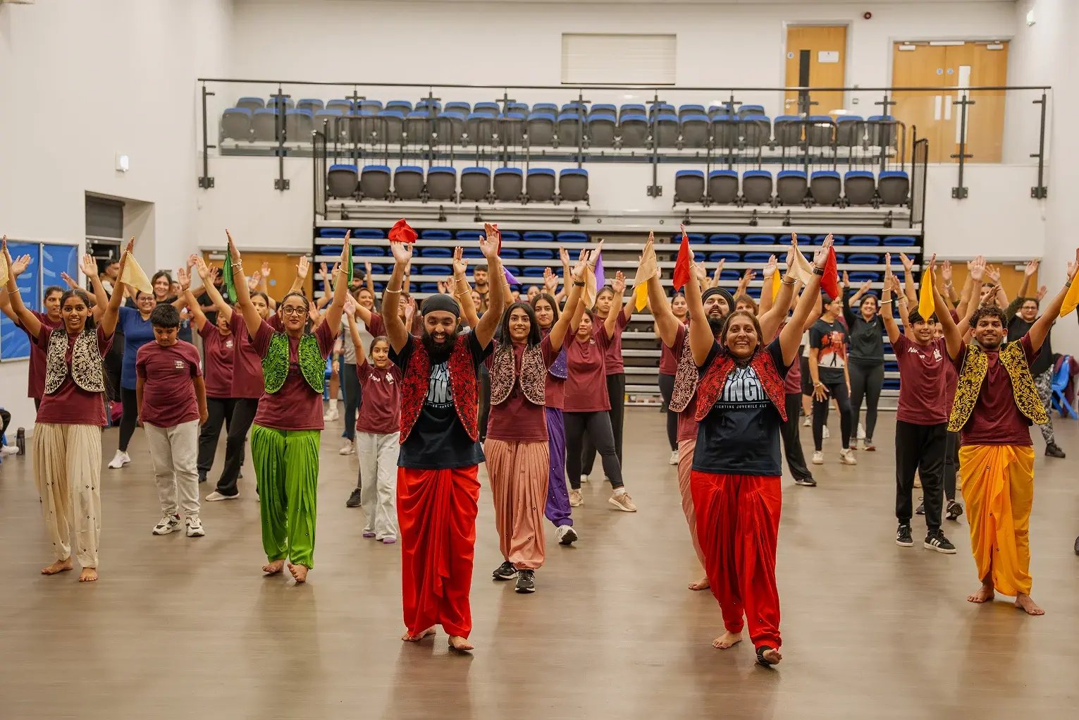 large-group-taking-part-in-bhangra-dance-class